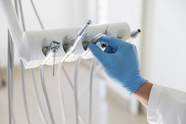 Professional Tooth Extraction technician working in Oakwood, IL